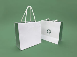 ベリービーサンプルSAMON茶紋のロゴと波紋に浮き出し加工と切り抜き加工が施されたオリジナル紙袋