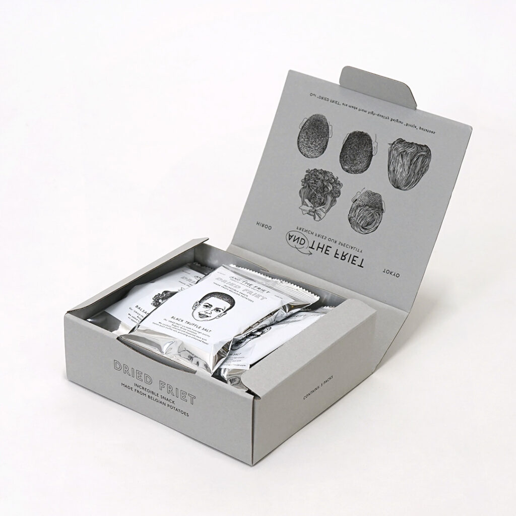 イラストレーターanje jagar氏が描く様々な表情の顔をフィーチャーした、フレンチフライ専門店のモノトーンオリジナルボックス