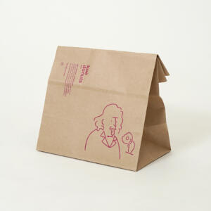 クラフト紙に描かれたポップで可愛らしいイラストが印象的なドーナツファクトリーのオリジナル紙袋