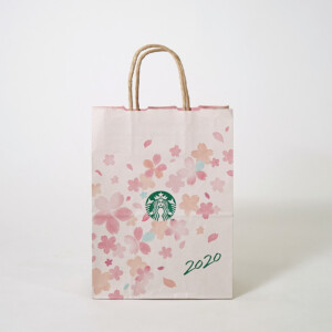 淡いピンク色の桜のグラデーションをフルカラー印刷で表現した、超有名コーヒーショップのクラフト紙素材の2020年SAKURAシリーズ限定オリジナル紙袋