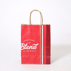 ストライプのデザインが印象的な、超有名コーヒーショップのクラフト紙素材のクリスマスホリデーシーズン限定オリジナル紙袋 