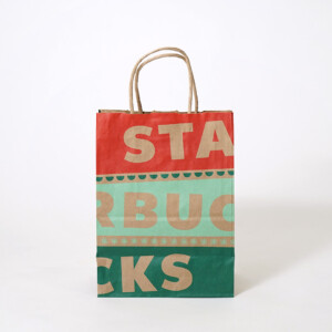 裏面の３分割された配色のデザインが印象的な、超有名コーヒーショップのクラフト紙素材のクリスマスホリデーシーズン限定オリジナル紙袋