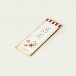 コックさんのイラストと問いかけのセリフが書かれた、ベーカリーのかわいい商品カード裏面