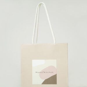 ナチュラル・オーガニックコスメショップの縦留め仕様が美しいオリジナル紙袋