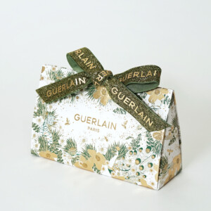 ラグジュアリーコスメブランドの箔押し加工を用いて「美しく着飾った動物たちの晩餐会」を描いたゴージャスで特別なプレゼントバッグ