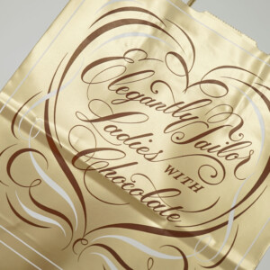 ゴールドインク印刷が施されたチョコレート専門店の高級感漂うオリジナル紙袋