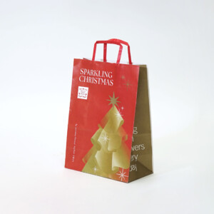 ゴールドのクリスマスツリーと星がデザインされた、クラフト紙に全面フルカラー印刷された、フラワーショップのホリデー限定オリジナル紙袋