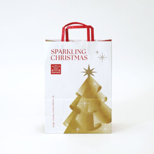 背面がビビッドレッド、正面がホワイトの晒クラフト紙にフルカラー印刷されたフラワーショップのホリデー限定オリジナル紙袋