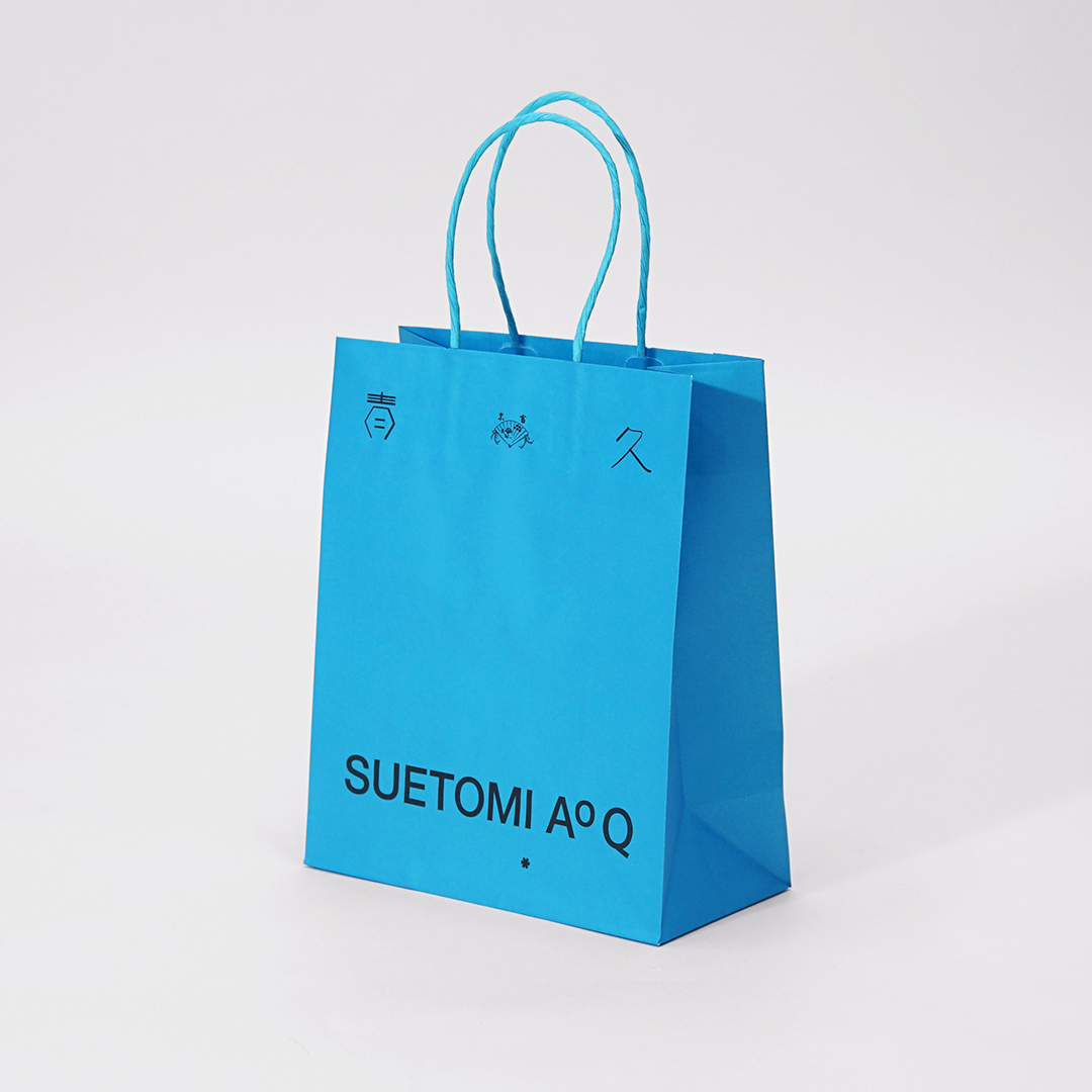 歴史や伝統を守る京菓子ブランドの現代的な紙袋デザイン