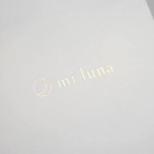 ターコイズのハンドルカラーが目を惹く紙袋5