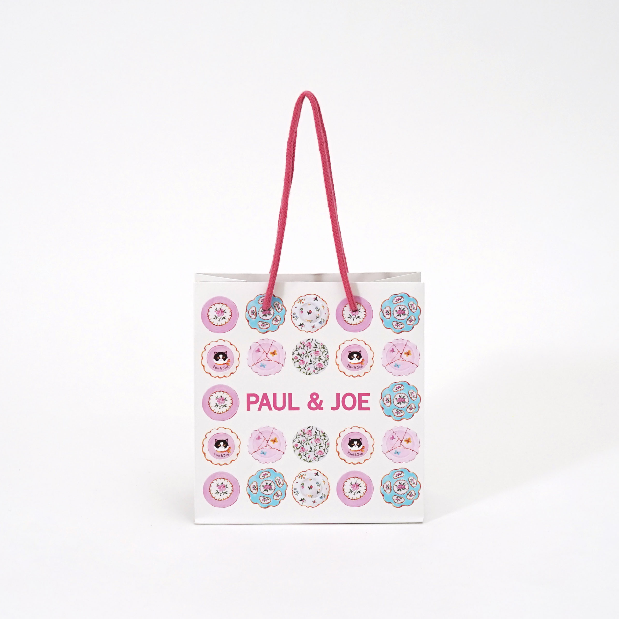 春の訪れを感じさせるパステルカラーのフェミニンな紙袋