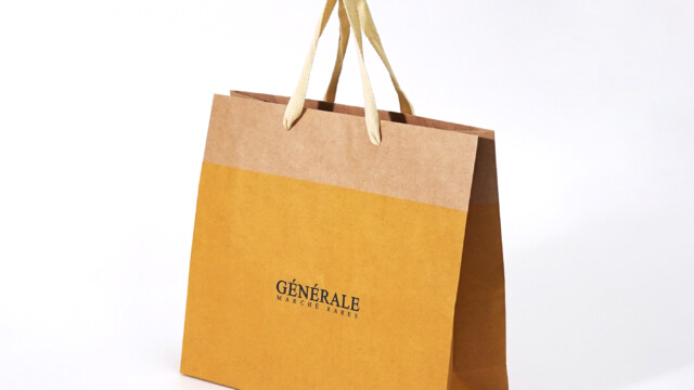 温かみのある配色が美しいセレクトショップの紙袋を読む