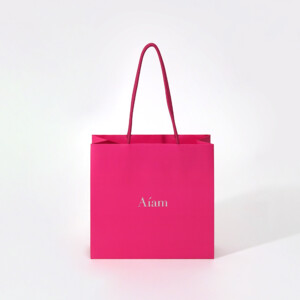 鮮やかなビビッドピンクのオリジナル紙袋