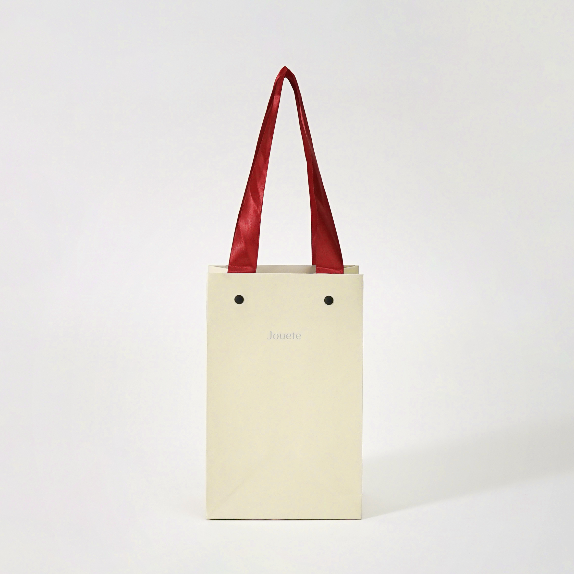 ハンドルの切り替えがおしゃれなホリデー限定紙袋