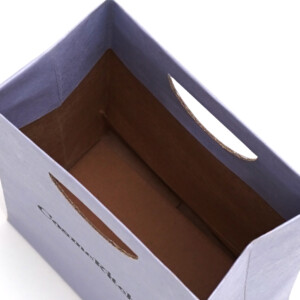 オーガニックコスメショップのカラフルな小判抜きが可愛いオリジナル紙袋