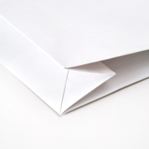 底面に施されたV字折り加工が美しいフォルムを生む。和洋菓子専門店のオリジナル紙袋